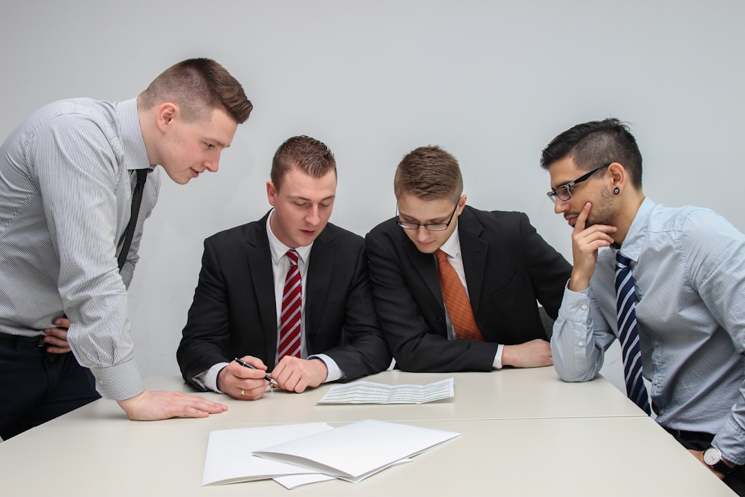 Business partners reviewing documents for a UAE shareholder dispute article